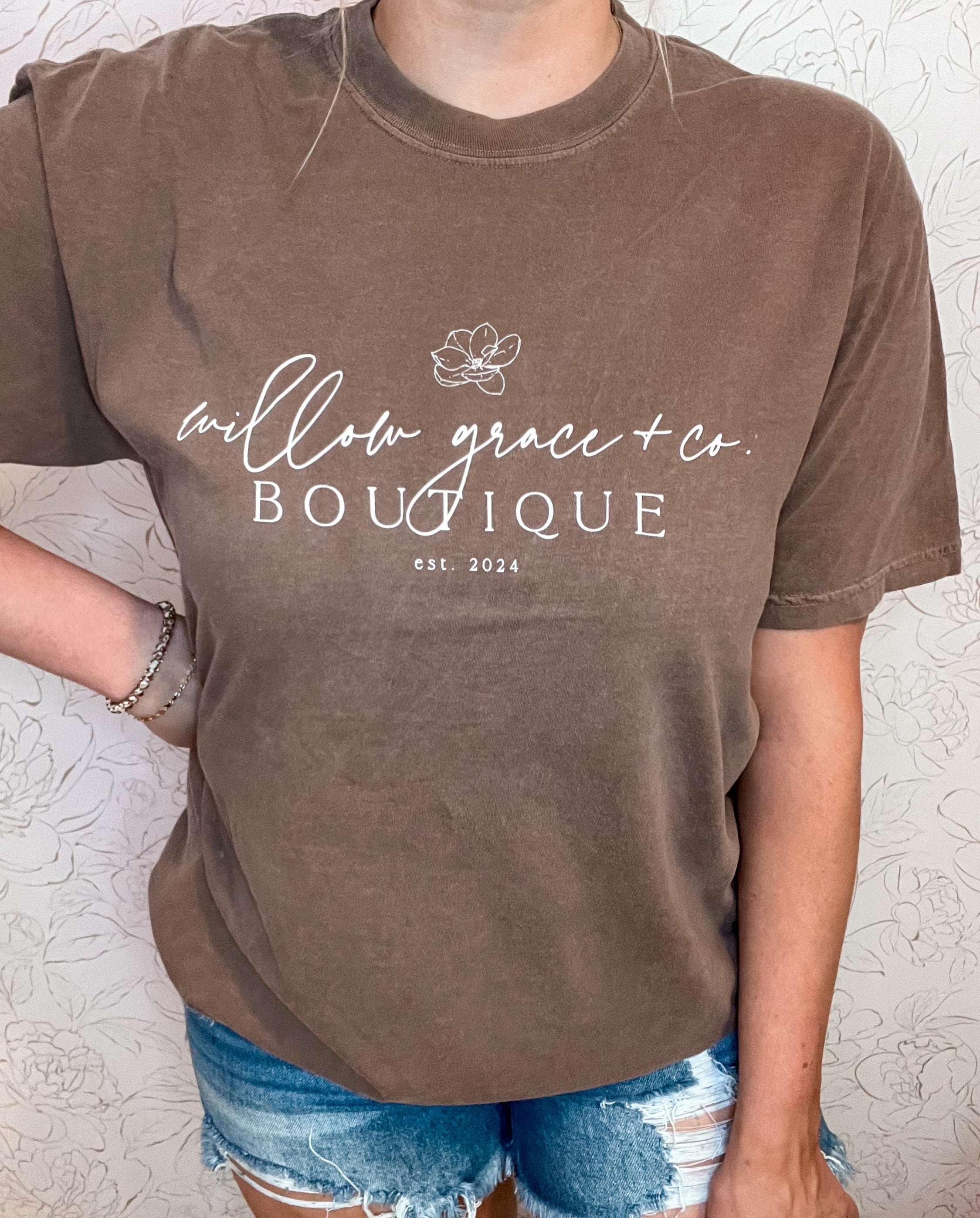 A Comfort Colors tee in Espresso color featuring the Willow Grace and Co main logo across the front in white.